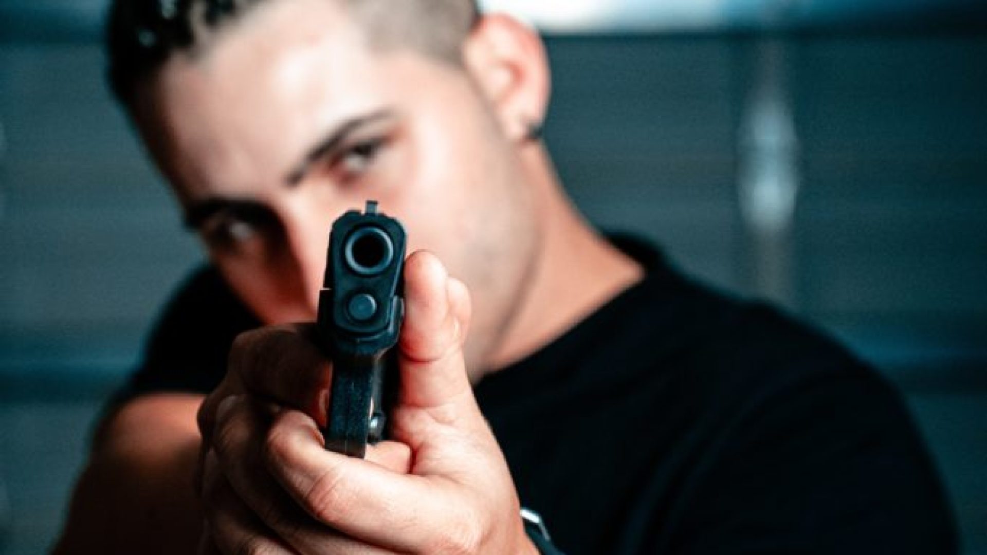 Is pointing a gun